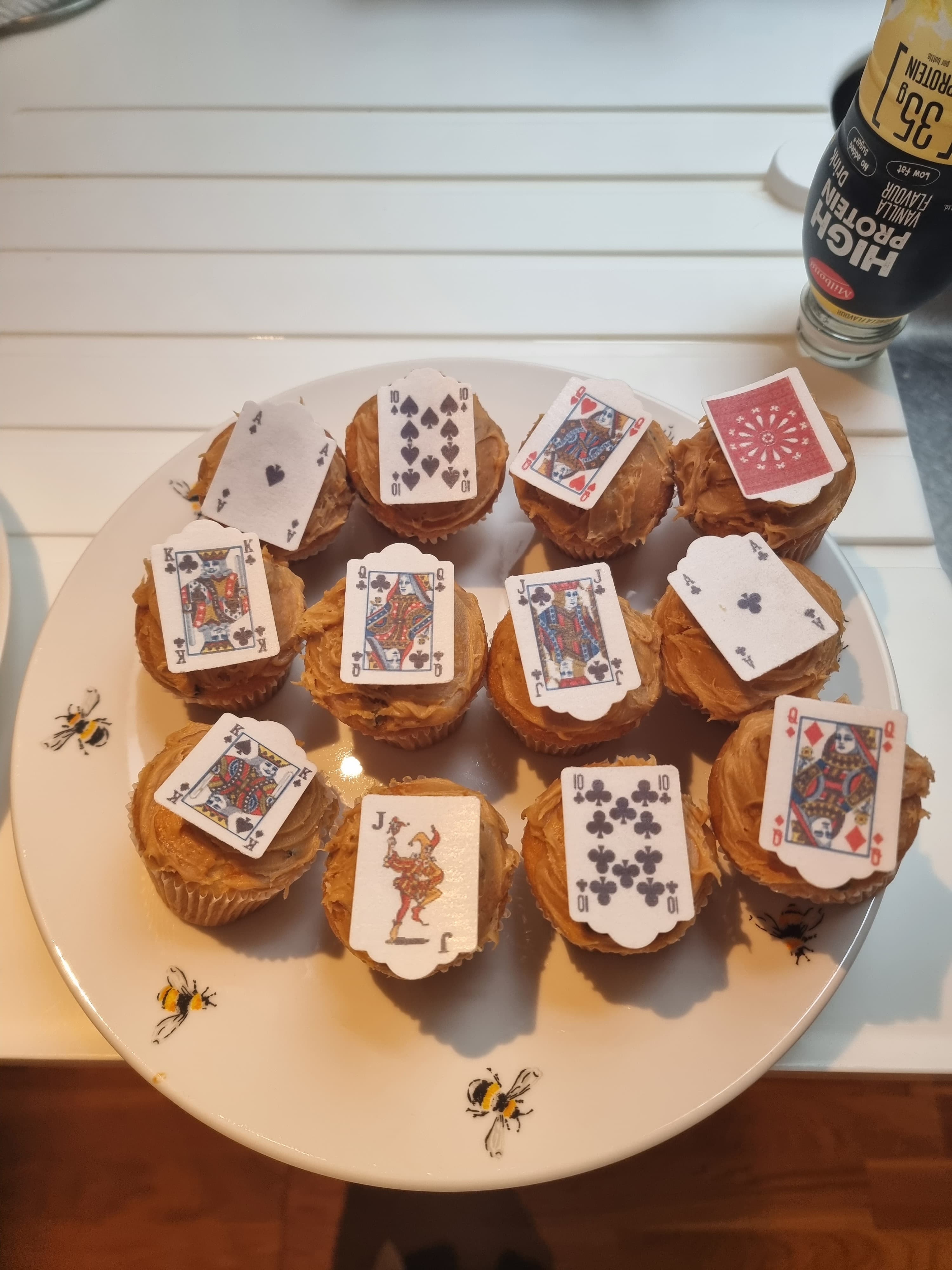 A plate of cakes decorated as poker cards