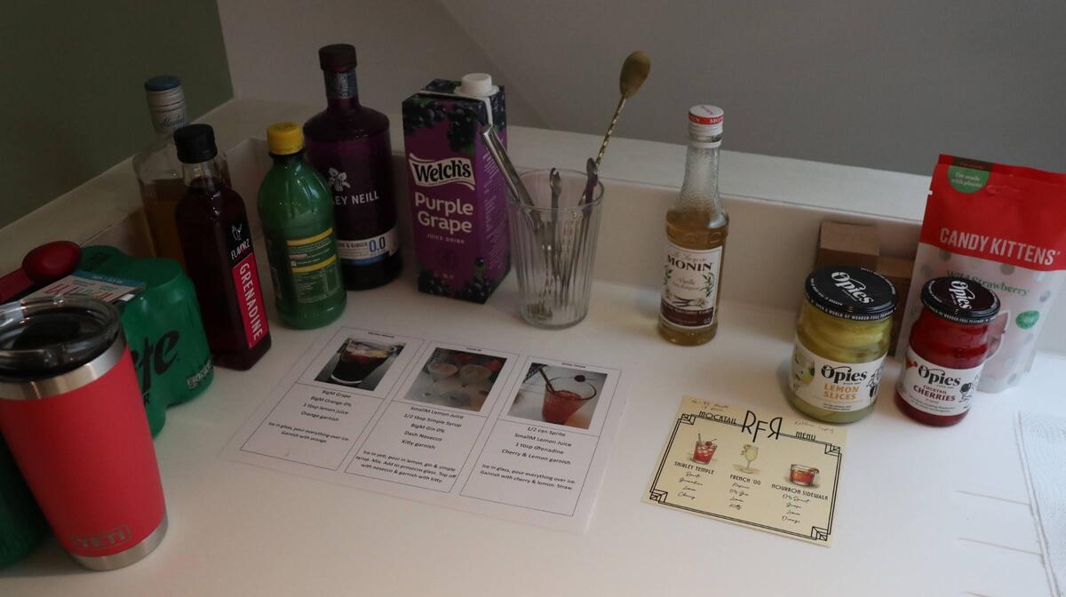 Bottles, mixers and recipes arranged for the Prohibition bar