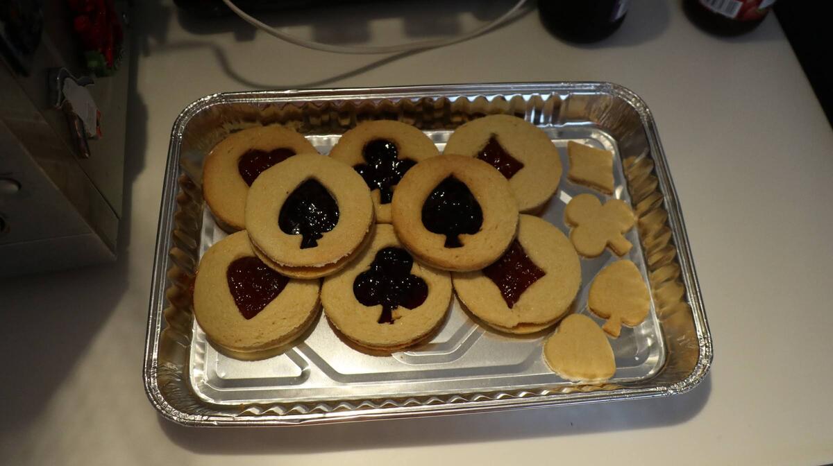 A tray of jam biscuits cut with card suit shapes